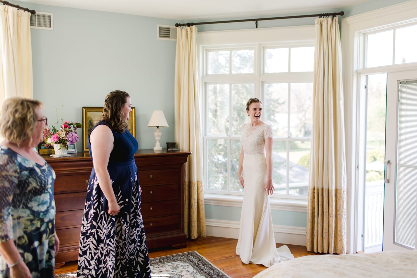 Bride in a lace and crepe gown by Lea-Ann Belter Bridal