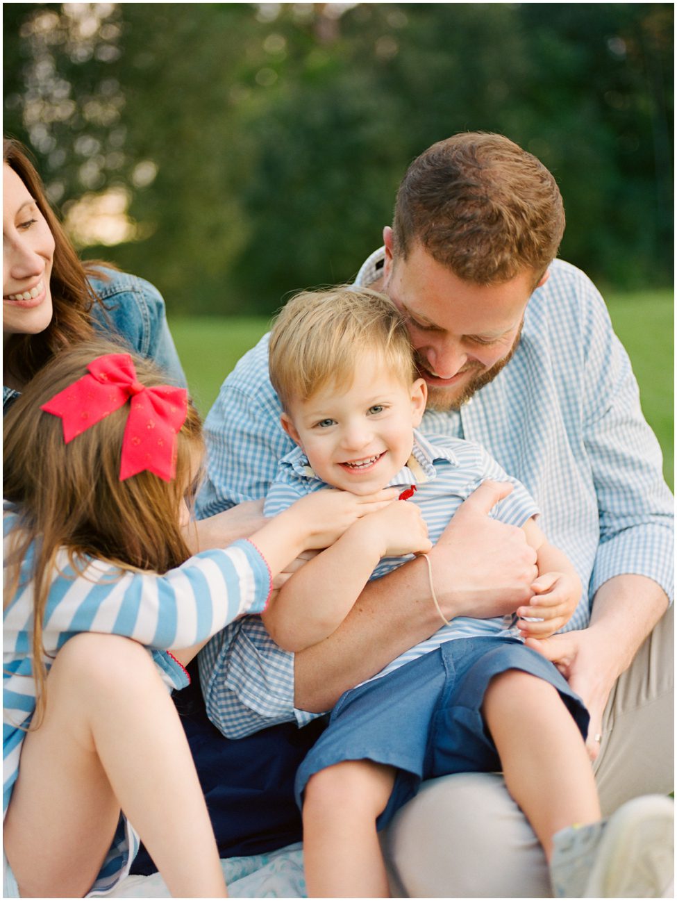 Buffalo Family Photographer Dad hugging son