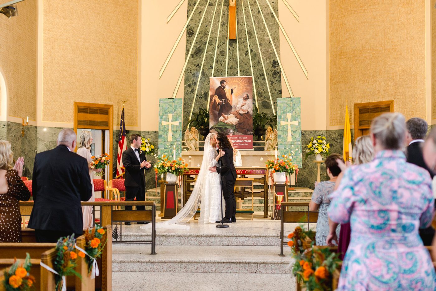 Bride and groom first kiss